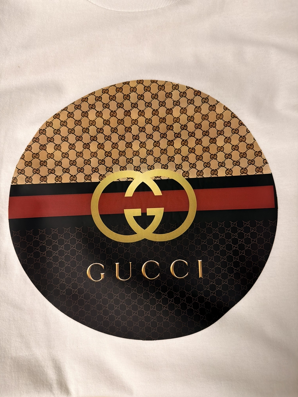 White Tee with Gold, Red and Black Circular Logo